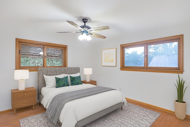 21130 Kildare Ave, Matteson, IL 60443 - bedroom featuring multiple windows, wood finished floors, and a ceiling fan