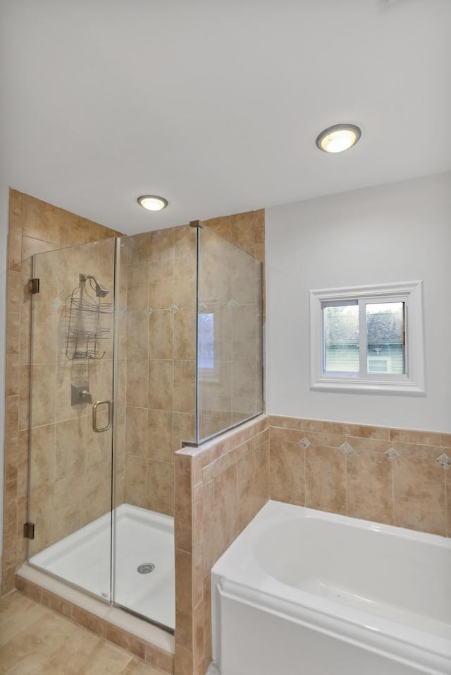21130 Kildare Ave, Matteson, IL 60443 - full bathroom with a bath, a stall shower, and tile patterned flooring