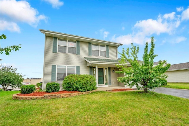 6621 Samantha Ln, Rockford, IL 61107 - traditional-style home featuring a front yard and driveway