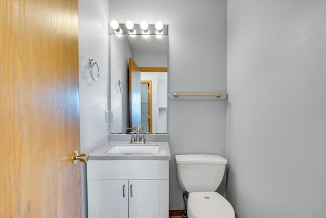 6621 Samantha Ln, Rockford, IL 61107 - half bathroom with vanity and toilet