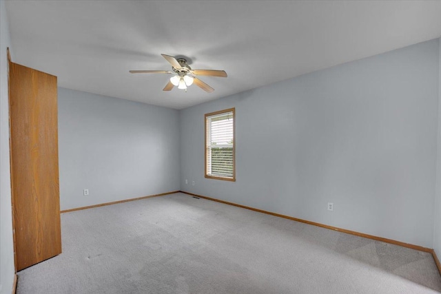 6621 Samantha Ln, Rockford, IL 61107 - empty room featuring a ceiling fan and carpet floors