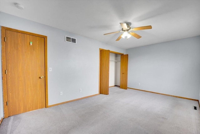 6621 Samantha Ln, Rockford, IL 61107 - unfurnished bedroom featuring light colored carpet, a closet, and a ceiling fan