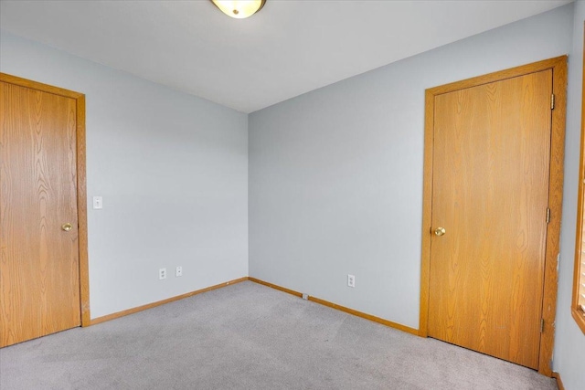 6621 Samantha Ln, Rockford, IL 61107 - unfurnished room with baseboards and carpet
