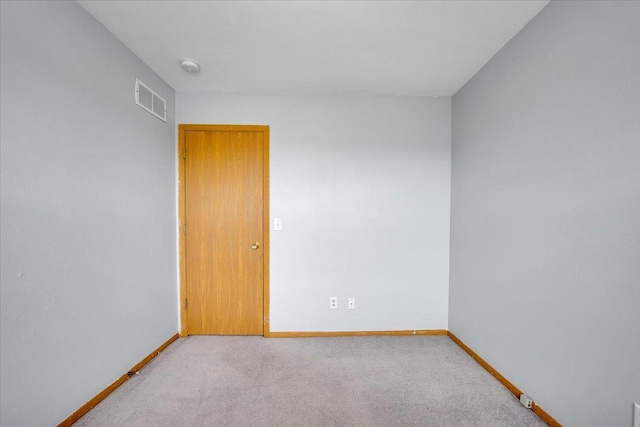 6621 Samantha Ln, Rockford, IL 61107 - spare room featuring light colored carpet and a smoke detector