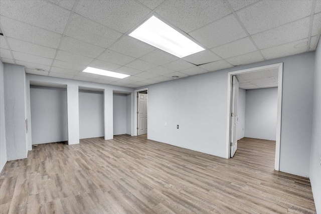 6621 Samantha Ln, Rockford, IL 61107 - basement featuring wood finished floors and a paneled ceiling