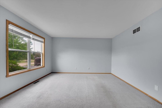6621 Samantha Ln, Rockford, IL 61107 - spare room featuring baseboards and carpet flooring