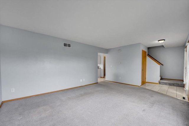 6621 Samantha Ln, Rockford, IL 61107 - empty room with light carpet and stairs