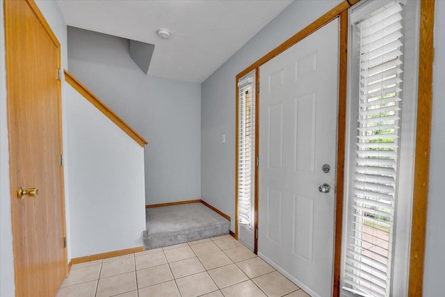 6621 Samantha Ln, Rockford, IL 61107 - entryway with plenty of natural light, light carpet, and light tile patterned floors