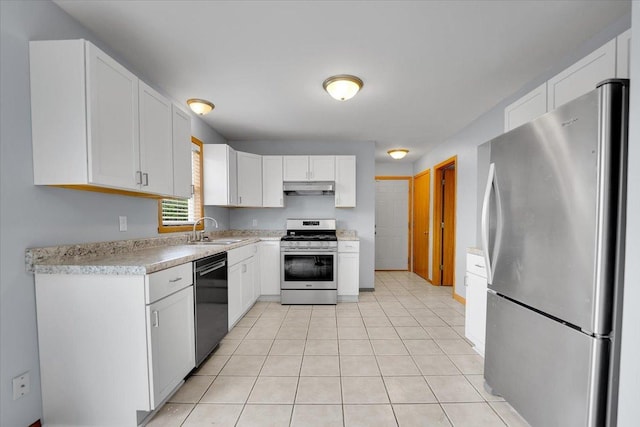 6621 Samantha Ln, Rockford, IL 61107 - kitchen with stainless steel appliances, under cabinet range hood, light countertops, white cabinets, and light tile patterned floors