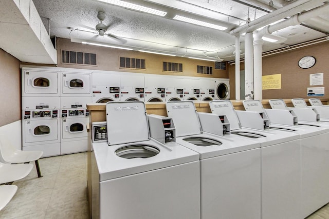 260 E Chestnut St Unit 1904, Chicago, IL 60611 - communal laundry room featuring independent washer and dryer, stacked washer and clothes dryer, and a ceiling fan