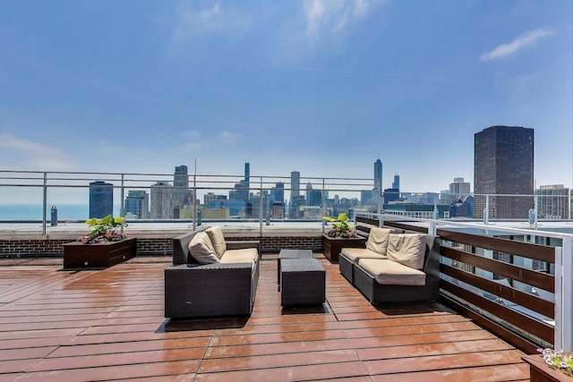 260 E Chestnut St Unit 1904, Chicago, IL 60611 - wooden terrace with a skyline view and an outdoor hangout area