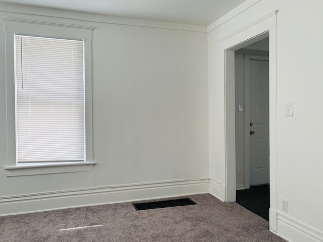 1347 Greenwood Ave, Rockford, IL 61107 - empty room featuring carpet floors and baseboards