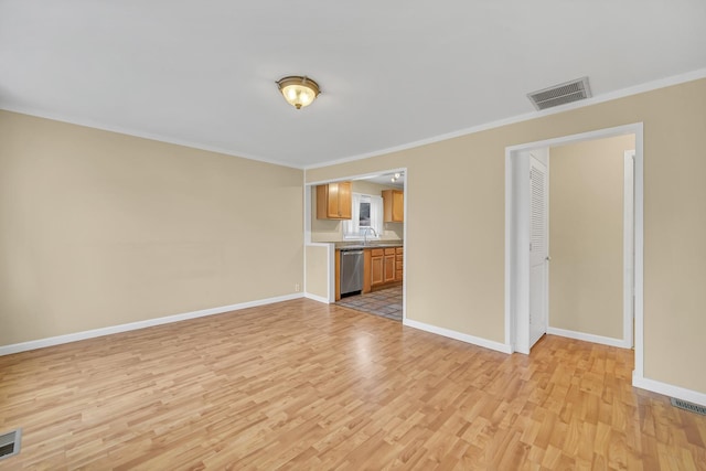 20772 N Elizabeth Ave, Prairie View, IL 60069 - unfurnished living room featuring light wood finished floors and crown molding