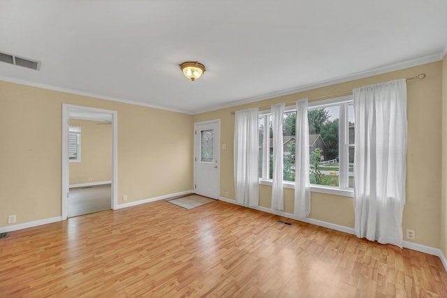 20772 N Elizabeth Ave, Prairie View, IL 60069 - empty room with ornamental molding and light wood finished floors