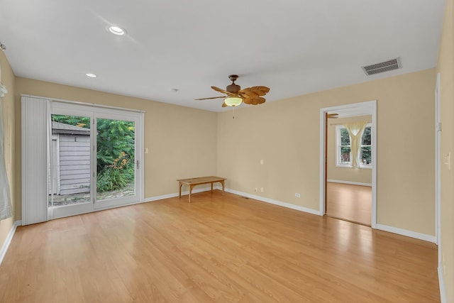 20772 N Elizabeth Ave, Prairie View, IL 60069 - unfurnished room featuring healthy amount of natural light, light wood-style flooring, ceiling fan, and recessed lighting
