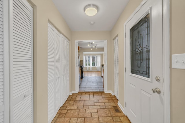 20772 N Elizabeth Ave, Prairie View, IL 60069 - hallway with stone tile floors and baseboards