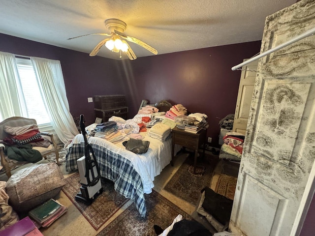 310 Eagle Bluff Dr, Oakwood, IL 61858 - bedroom with ceiling fan, wood finished floors, and a textured ceiling