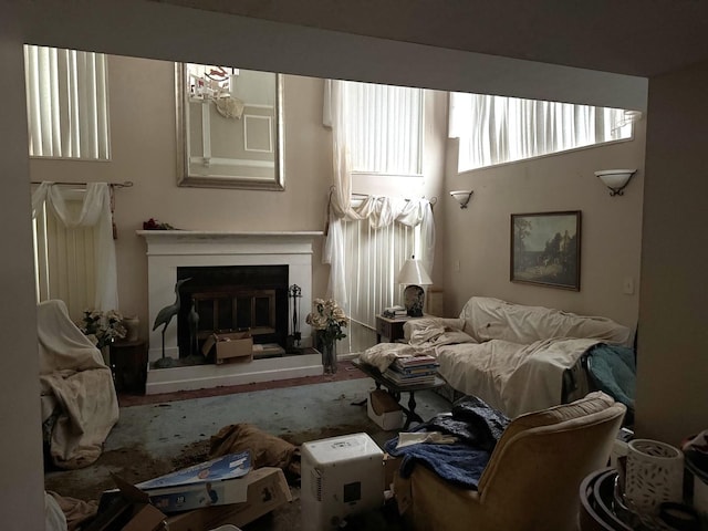310 Eagle Bluff Dr, Oakwood, IL 61858 - sitting room featuring a glass covered fireplace and carpet