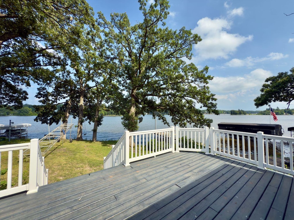 5114 W Lake Shore Dr, Wonder Lake, IL 60097 - deck with a water view and a lawn