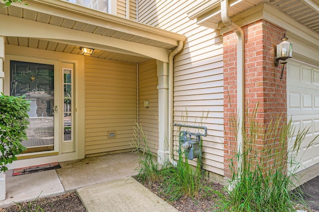 504 Lancaster Dr, Pingree Grove, IL 60140 - property entrance with brick siding