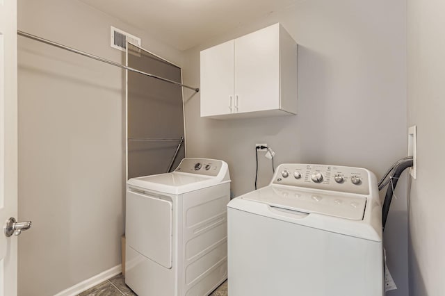 504 Lancaster Dr, Pingree Grove, IL 60140 - laundry room with washing machine and dryer and cabinet space