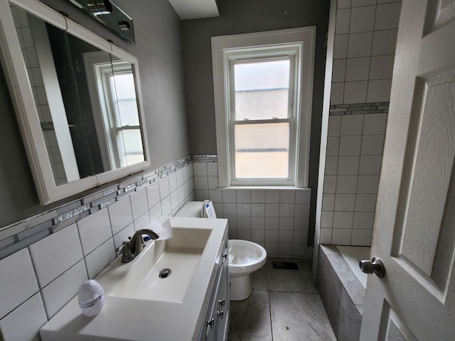 7542 S Prairie Ave, Chicago, IL 60619 - full bathroom featuring tile walls, vanity, tile patterned floors, and wainscoting