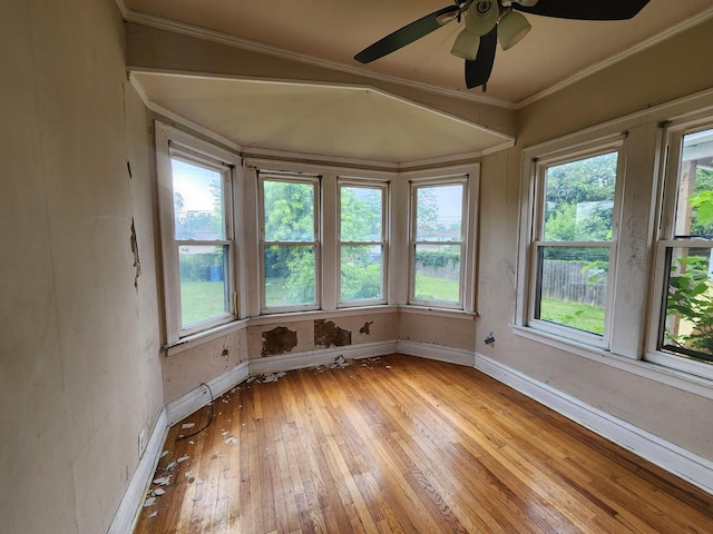 7542 S Prairie Ave, Chicago, IL 60619 - unfurnished sunroom with hardwood / wood-style flooring and crown molding