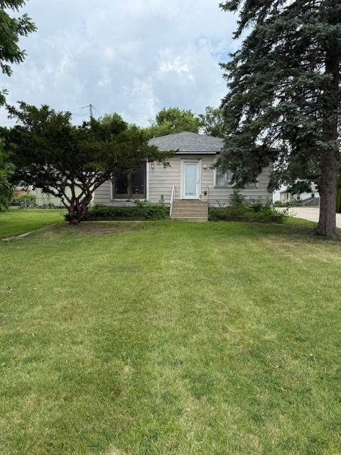25030 W Lake Shore Dr, Ingleside, IL 60041 - rear view of house featuring a yard