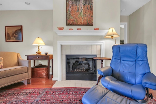1906 Lydia Ct Unit A, Urbana, IL 61802 - sitting room with wood finished floors and a fireplace