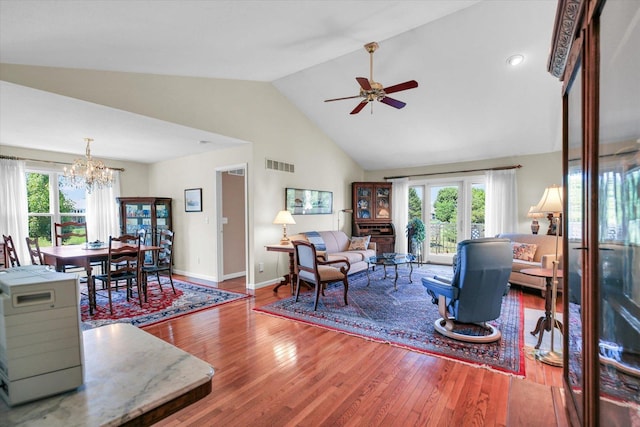 1906 Lydia Ct Unit A, Urbana, IL 61802 - living area with a chandelier, wood finished floors, plenty of natural light, ceiling fan, and high vaulted ceiling