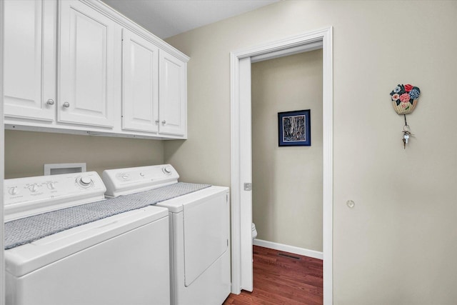 1906 Lydia Ct Unit A, Urbana, IL 61802 - washroom with washer and clothes dryer, cabinet space, and wood finished floors