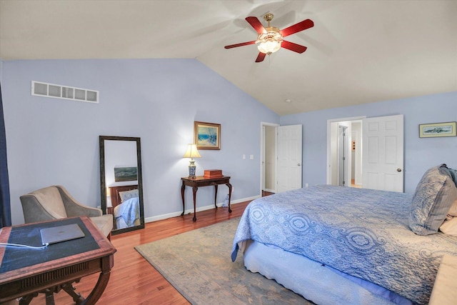 1906 Lydia Ct Unit A, Urbana, IL 61802 - bedroom featuring lofted ceiling, wood finished floors, and ceiling fan
