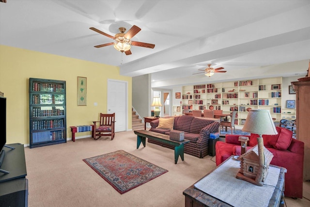1906 Lydia Ct Unit A, Urbana, IL 61802 - living area with carpet, ceiling fan, and stairway
