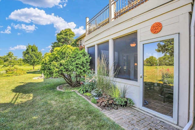 1906 Lydia Ct Unit A, Urbana, IL 61802 - view of grassy yard with a balcony