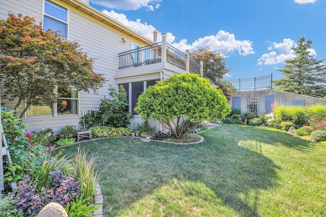 1906 Lydia Ct Unit A, Urbana, IL 61802 - view of grassy yard featuring a balcony