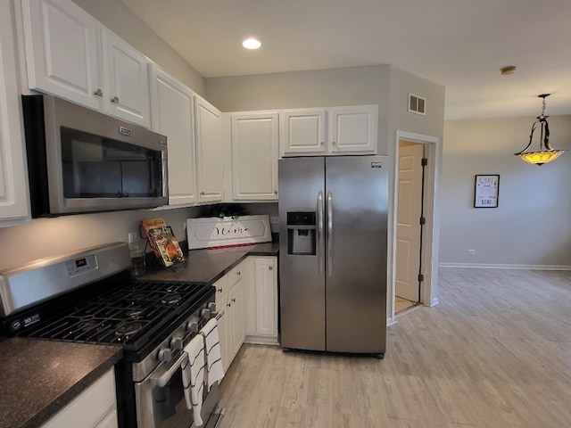 2949 Brossman St, Naperville, IL 60564 - kitchen featuring stainless steel appliances, light wood finished floors, dark countertops, white cabinetry, and recessed lighting