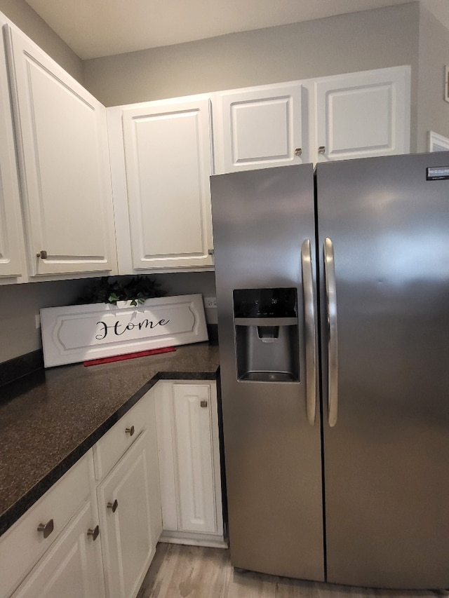 2949 Brossman St, Naperville, IL 60564 - kitchen with stainless steel refrigerator with ice dispenser, white cabinets, and dark countertops