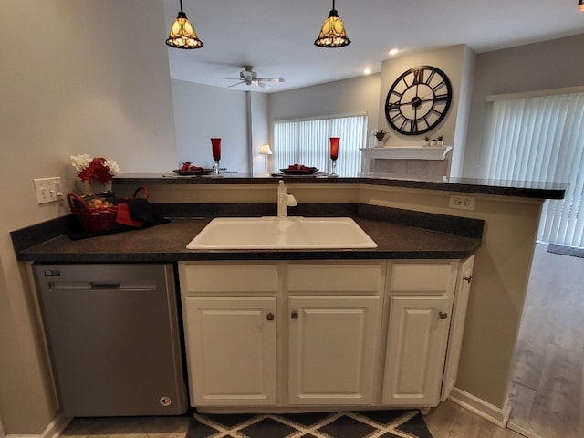 2949 Brossman St, Naperville, IL 60564 - kitchen with dishwasher, a ceiling fan, dark countertops, and white cabinetry