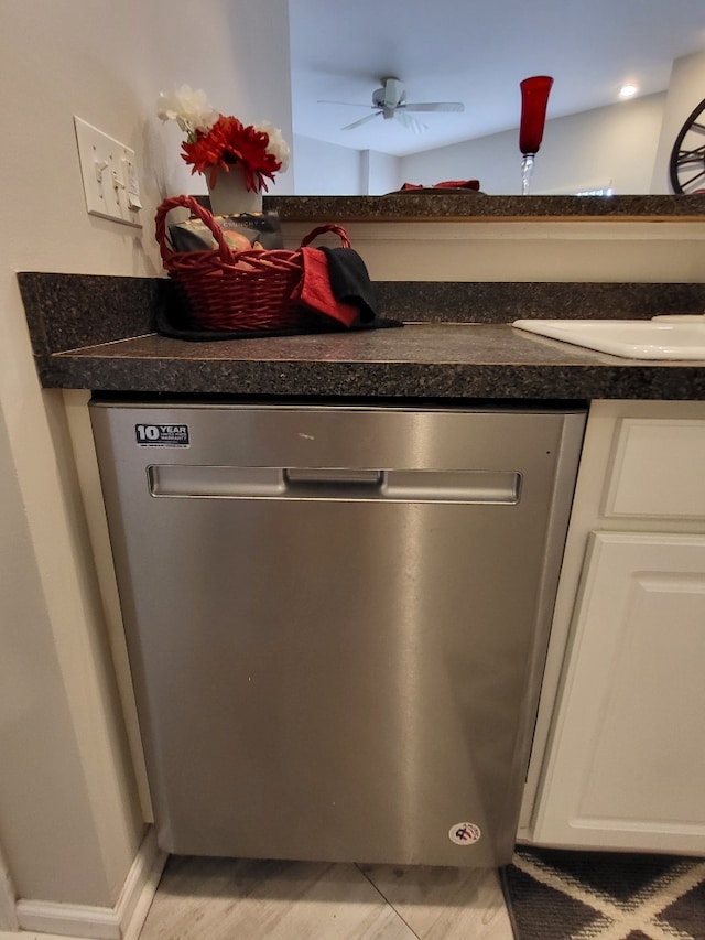 2949 Brossman St, Naperville, IL 60564 - detailed view of stainless steel dishwasher, white cabinets, and dark countertops