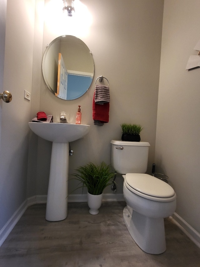 2949 Brossman St, Naperville, IL 60564 - half bathroom with toilet and wood finished floors