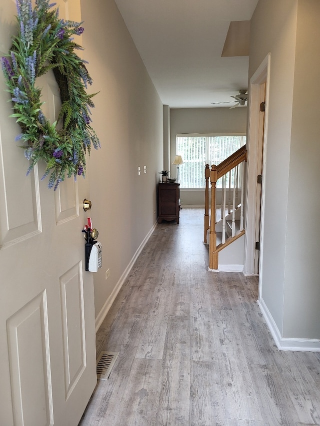 2949 Brossman St, Naperville, IL 60564 - corridor featuring wood finished floors and stairs