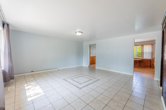 100 Patricia Dr, Schaumburg, IL 60193 - spare room with light tile patterned floors and baseboards