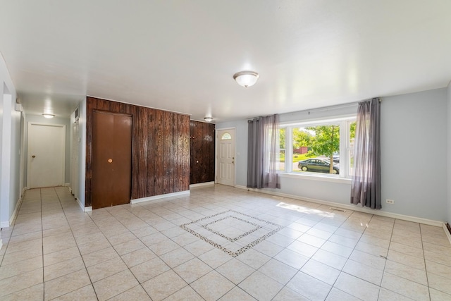 100 Patricia Dr, Schaumburg, IL 60193 - empty room featuring light tile patterned floors and baseboards