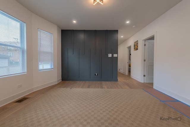 11956 S Harvard Ave, Chicago, IL 60628 - unfurnished bedroom with light wood-style floors and recessed lighting