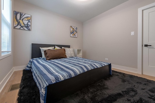 11956 S Harvard Ave, Chicago, IL 60628 - bedroom with wood finished floors and baseboards