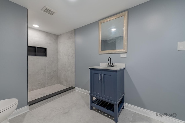 11956 S Harvard Ave, Chicago, IL 60628 - bathroom featuring vanity, a tile shower, and recessed lighting