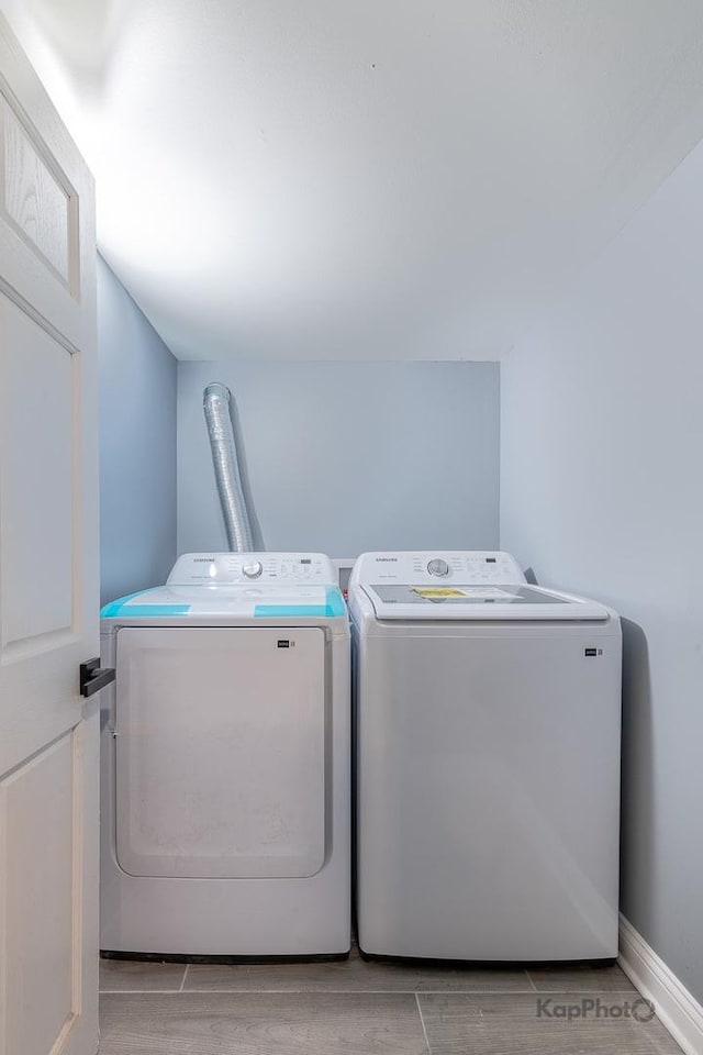 11956 S Harvard Ave, Chicago, IL 60628 - laundry area featuring independent washer and dryer and baseboards