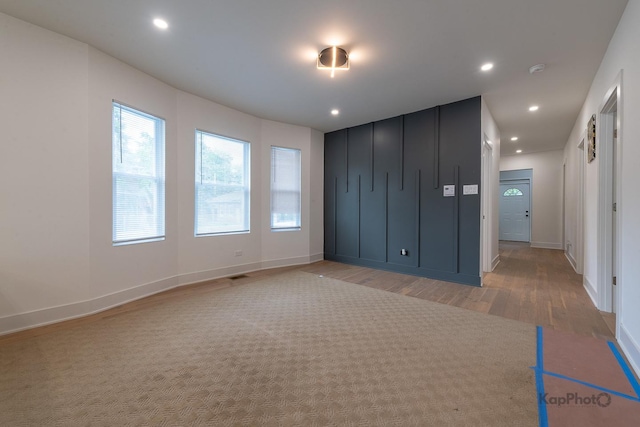 11956 S Harvard Ave, Chicago, IL 60628 - unfurnished bedroom with light wood-style flooring and recessed lighting