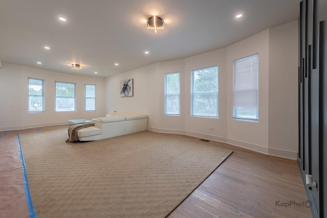11956 S Harvard Ave, Chicago, IL 60628 - unfurnished living room with recessed lighting and wood finished floors