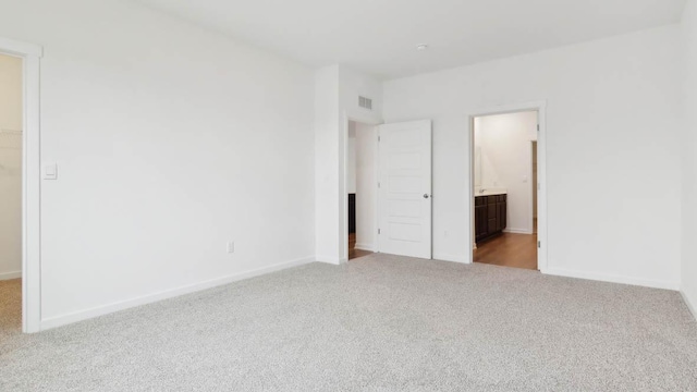 2275 Redwood Trl, Wonder Lake, IL 60097 - unfurnished bedroom with carpet and connected bathroom